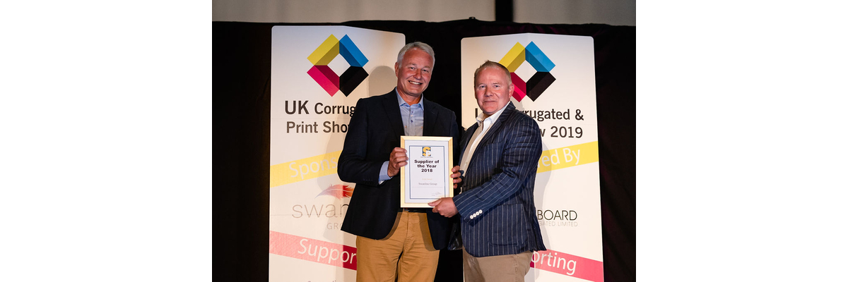 Nick Kirby of Swanline Print receiving the SPA Supplier Gold Award from Tim Gray, Chairman of SPA